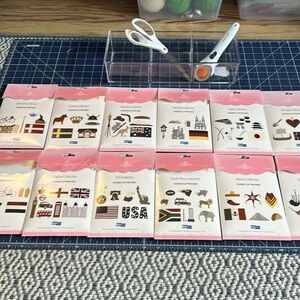 Bundle of 14 Quickutz Around the World thin metal cutting dies